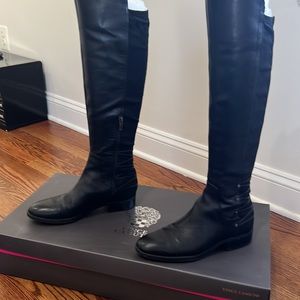 Vince Camuto leather and suede boots.